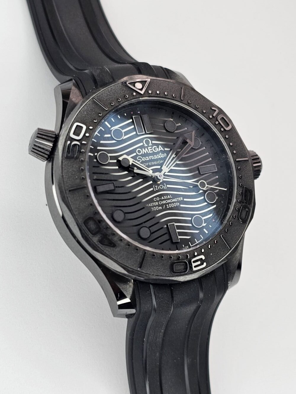 Omega Seamaster 300 black ceramic watch black dial black rubber